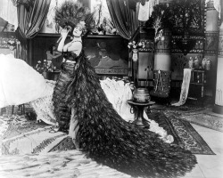 wehadfacesthen:  Theda Bara wearing a gown of peacock feathers in Cleopatra (J Gordon Edwards, 1917) With the implementation of the Hayes Code, Cleopatra was judged too obscene to be shown. The last two prints in existence were destroyed by fires at