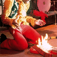 clarabows:  Jimi Hendrix setting his guitar on fire, Monterey Pop Festival, 1967. 