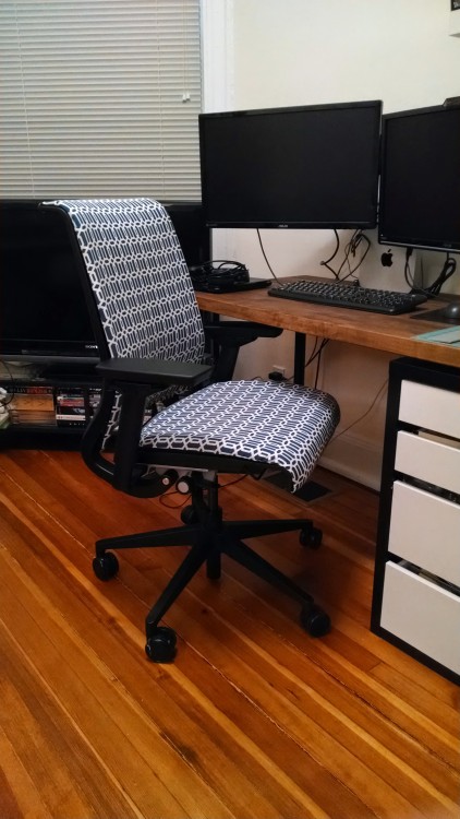 What happens when the used chair you buy at significant discount from a shady Internet retailer turns out to be an intensely ugly ‘80s orange and your girl forbids it from staying in the house? You tear it apart, get some fabric, and recover it.