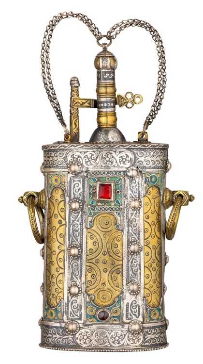 Silver and gold gilt gunpowder flask, from The Caucasus, 18th or early 19th century.from Olympia Auc