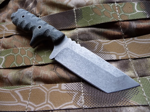 ru-titley-knives:Stone washed Cold Steel.New black canvas micarta sculpted scales over orange G-10 l