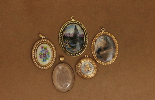 Vintage lockets &amp; pendants.  Coming soon in store!