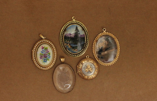 Vintage lockets & pendants.  Coming soon in store!