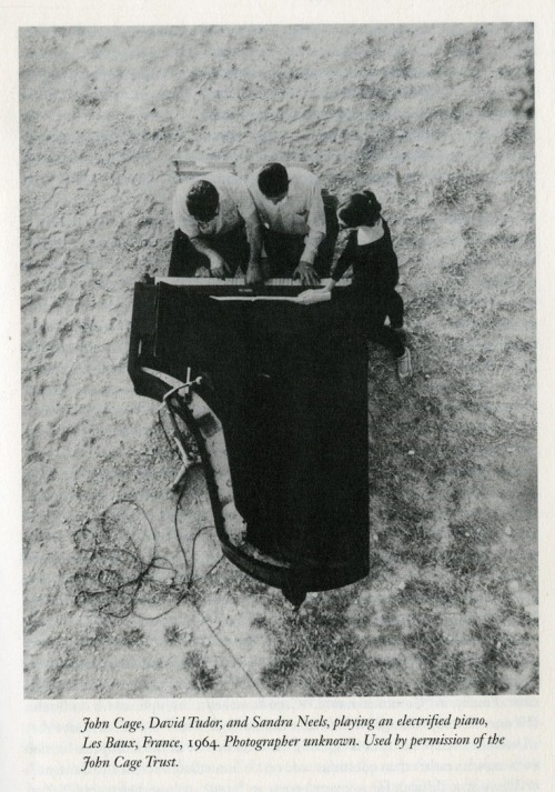 cluster123456:  John Cage, David Tudor and Sandra Neels playing an electrified piano, 1964.