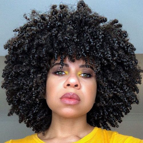 Repost from @naturally_charlette•Even if I didn’t want to be noticed my afro wouldn’t allow it.#hair