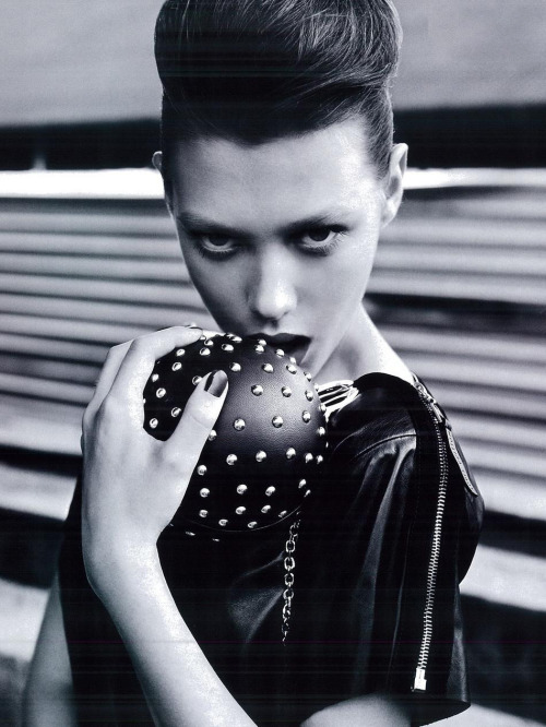 Dasha Fedotova - Louis Vuitton leather top, Louboutin studded leather bag