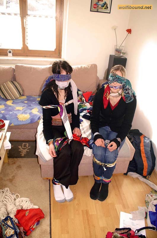 graybandanna:  Tying up her friend before joining her in scarf bondage