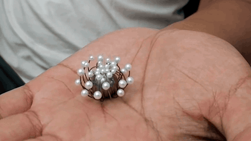 treasures-and-beauty:Blossom Ring. Designed by Chi Huynh, Galatea Jewelry. Made from nitinol, an all
