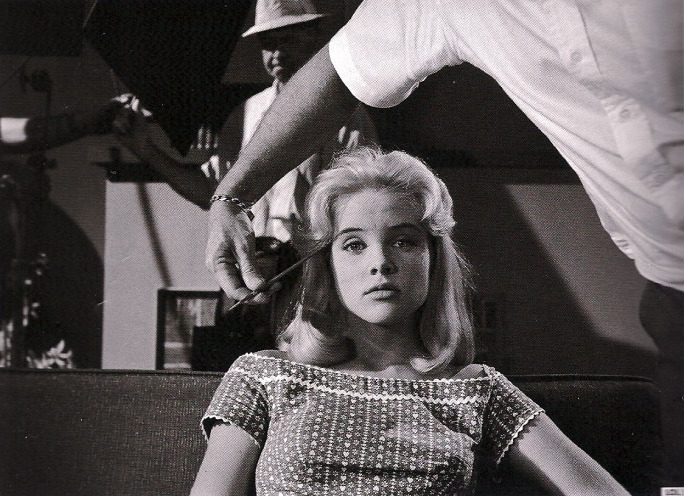 Director Stanley Kubrick took this photo of Sue Lyon being primped by the make up