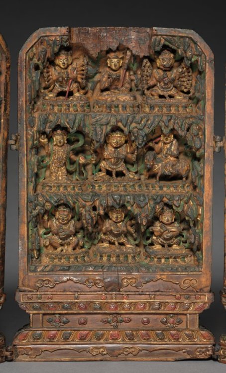 Portable Shrine, c. 1500Tibet, early 16th centurywood with mineral pigments, Diameter: w. 16.20 cm (