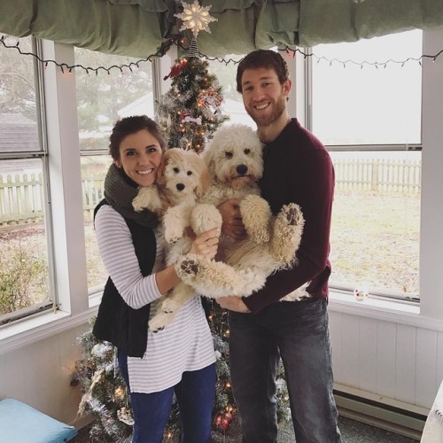 Jaccob Slavin and his wife, Kylie, with their two dogs, Simba and Lola, during Christmas 2016(Source