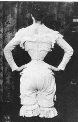 A Gibson Girl in her corset in the early