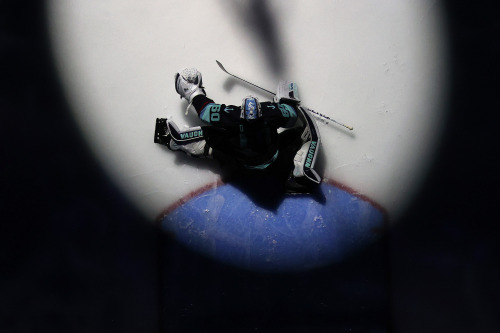 tapedsleeves: jaredmccann:(x) [Image Description: four images of Hockey players from above with dram