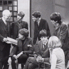 Arriving At The Scene For Their Interview "RoundUp" April 30, 1964 // John Looking Glum When Paul Asked