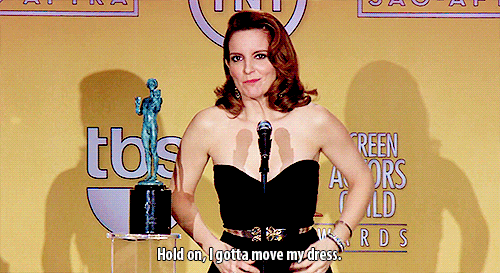 deschanels:Tina Fey in the press room at the 19th Annual SAG Awards