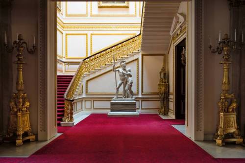 The Ministers’ Staircase: Buckingham Palace. The torchere’s came from the throne room at Carlton Hou