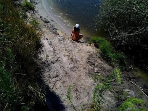 Nudist pees during a hike