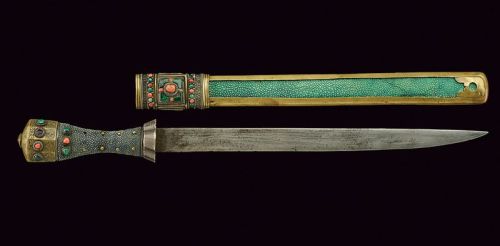 art-of-swords:  Tsep-sa Sword Dated: 19th century Culture: Tibetan Measurements: overall length 45 cm The sword features a straight, single-edged blade of typical shape, with a hollow brass quillon with external silver plating. The grip is covered with
