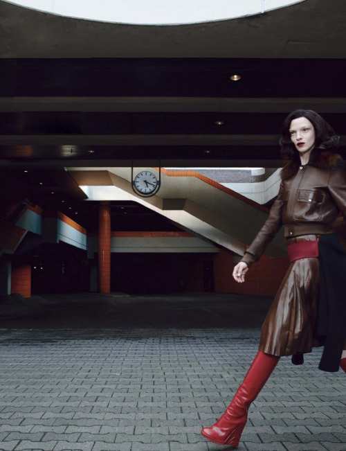 designerleather:  Mariacarla Boscono for W Magazine - Givenchy leather jacket and skirt, Prada boots