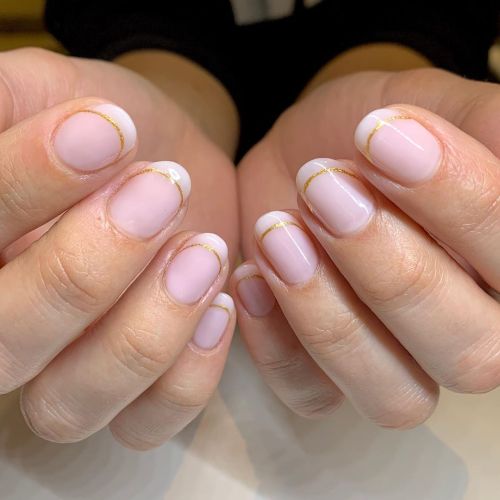 A clean and modern take on the classic French manicure featuring @cndworld Bouquet as the base shade