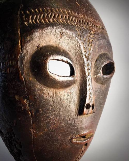 With Disguise: Masks and Global African Art  just a month away, we’re looking at—and through—m
