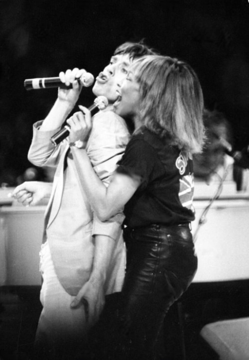 sbrown82: Tina Turner singing a duet with Mick Jagger during a concert for the Rolling Stones Americ