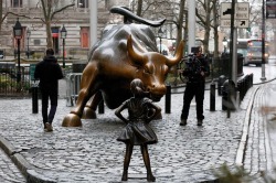 itscolossal: A Statue of a Defiant Girl Now Confronts the Famous ‘Charging Bull’ on Wall St.