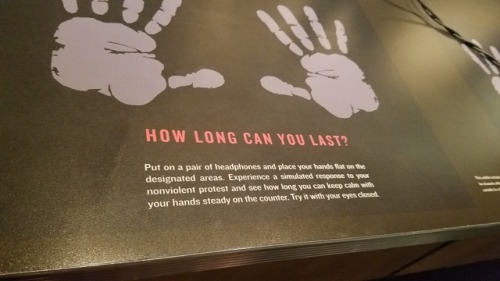 fandomsandfeminism:  nearly-headless-horseman:   fandomsandfeminism:   Part of my roadtrip tool me to Atlanta. And, the Civil Rights Center was amazing. Very powerful. They have this one exhibit where you sit at a lunch counter and close your eyes and