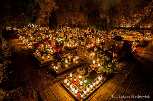 lamus-dworski:Cemetery in Żabikowo, Poland, illuminated with thousands of grave candles for the 1st 