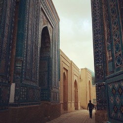 pheezy:  Shah-i-Zinda is not just a cemetery, it’s a showcase of some of the most intricate mosaic and tilework of the Muslim world. Walking through this initial “canyon” of mausoleums brings you to a promenade of other resting places of prominent