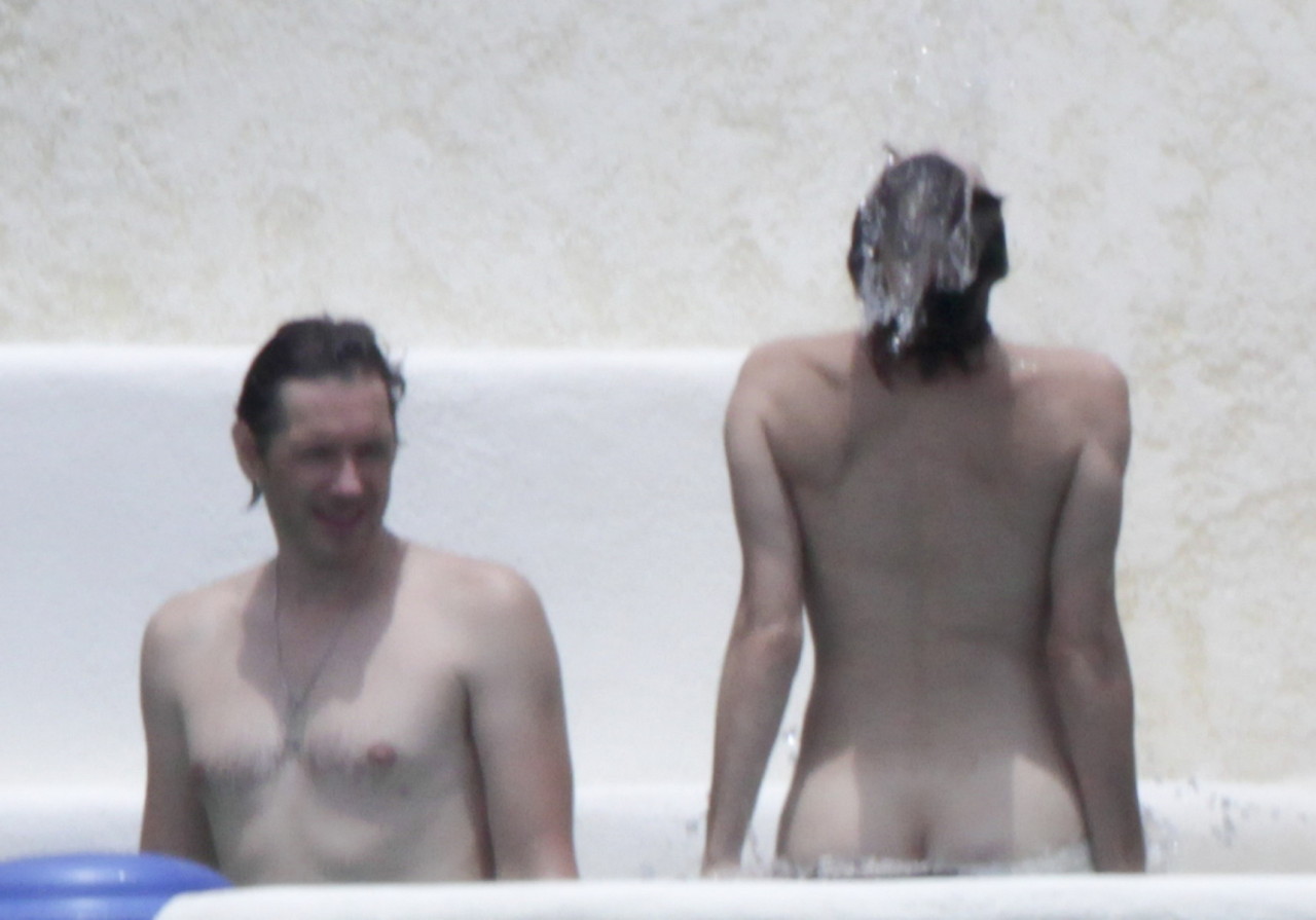 toplessbeachcelebs:  Milla Jovovich (Actress) in a jacuzzi topless in Los Cabos (August