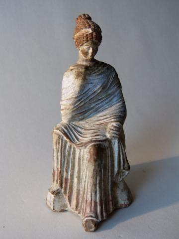 mini-girlz:Ancient statue of Tanagra, Greek sculpture, 3rd century BC Statuette of woman sitting, dr