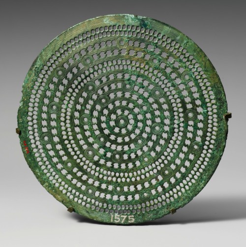 heracliteanfire:Bronze perforated disc. Italic, early 7th century B.C. (via The Metropolitan Museum 