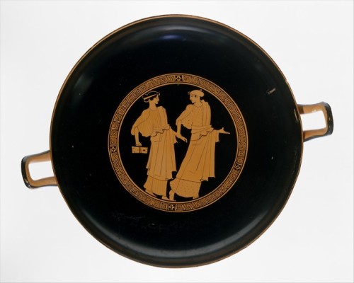 Two women, one with writing tablets and stylus, on a walk.  Interior of an Attic red-figure kylix, a