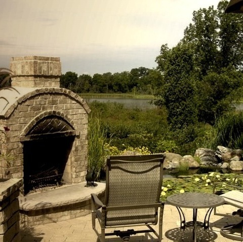 Brick Pavers Patio In MilwaukeePatio - Mid-sized Traditional Backyard Brick Patio Idea With A Fire Pit