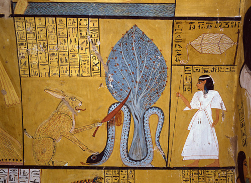 Under a sacred sycamore the sun god Ra, in the form of a cat, slays the snake Apep (or Apophis), god