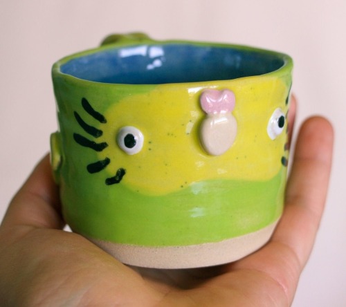 sosuperawesome:  Bird Mugs, Dishes and PlantersArtistic Parrot on Etsy 