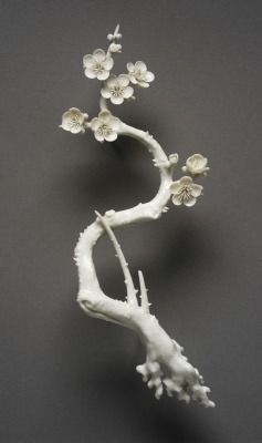 aleyma:  Porcelain weight in the form of a plum branch, made in Japan in the 19th century (source).