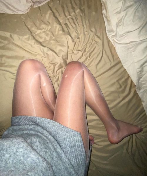 XXX Relaxing in pantyhose on bed photo