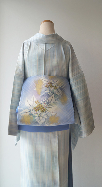 Watercolor-like outfit, with multicolored stripes kimono, paired with luminous ajisai (hydrangea) ob