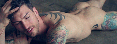 dominicanblackboy:  Sexy gorgeous hot tatted muscle ass Adam Von Rochfelder naked while the picture moves! 