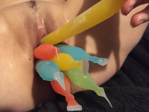 strechingisfun:  I went from fucking a cold bottle to frozen popsicles!  I have a few more. Should I go for 12? #coldisamazing #feelthecold #makesmehot #horny #naughty #fuckmyself  Using icy dildos like this has the side benefit of making your gape close