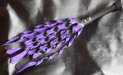 edgeplay-co-uk:  submissivefeminist:  edgeplay-co-uk:  Stingy, sexy, sensual flogger with black and purple twisted falls.  As with most of our creations, this is a one-off piece and it is available now on Impact-Toys.com  Beautiful work, as always. 