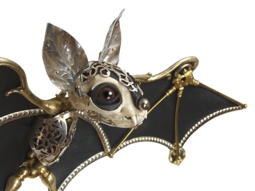 cross-connect:  Jessica Joslin transforms unexpected found objects such as bullet casings, old brass buttons, musical instrument parts, bones, and other nostalgic ephemera into skeletal animal figurines ranging in size from one inch to six feet. Her