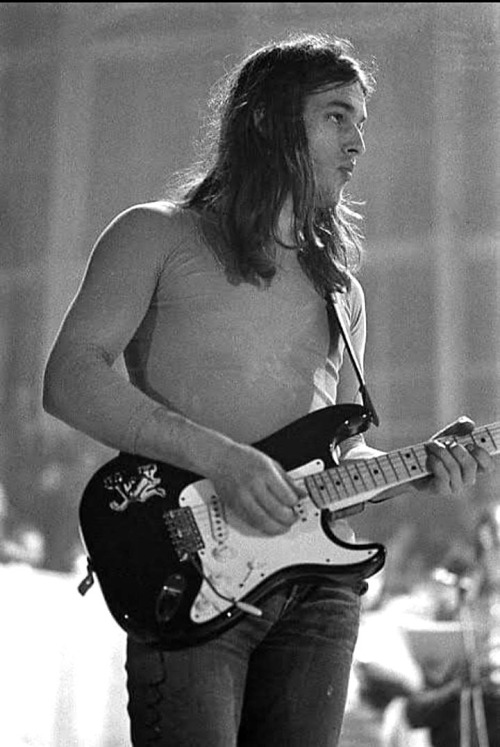 soundsof71:  David Gilmour and the Roadrunner Strat (that’s a sticker of yes, The Roadrunner, on the upper bout of his guitar) with Pink Floyd in Munster, Germany, February 24,1971.   (Not shown: me puckering up in return to kiss David.) My edit of