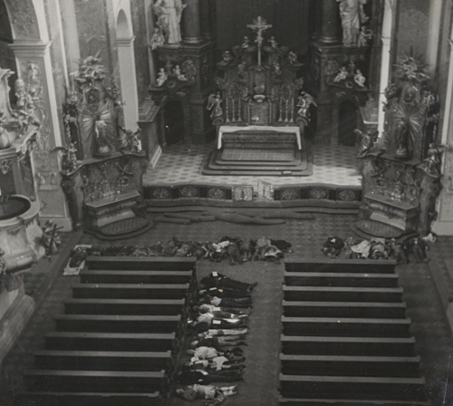 Dead bodies brought in the St. Ignatius Church, Prague, following a U.S. bombing raid on Prague on 1