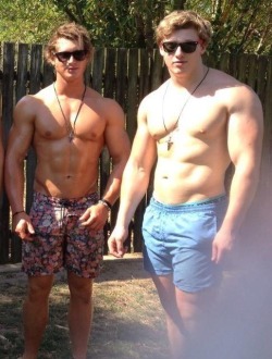 keepemgrowin:  The stud on the right has been doubling-up on the protein shakes…