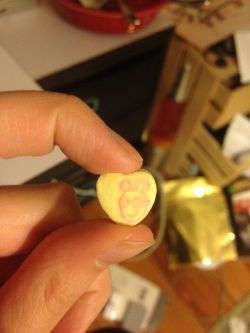 little-whorecrux:  sweet-bitsy:  minaleonhardt:  I WAS SITTING HERE EATING CANDY HEARTS AND LITERALLY EVERY SINGLE ONE OF THEM HAS HAD WORDS ON IT ONLY BUT I JUST FOUND THIS ONE WITH ARTHUR’S FACE ON IT???? HOW AND WHY PLEASE EXPLAIN  It’s a simple