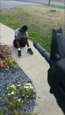 weallheartonedirection:  Cousin just posted this from his facebook, guy tried to kick in his door only to be met with an ar-15 on the other side. He’s keeping him under citizens arrest till the cops arrive.