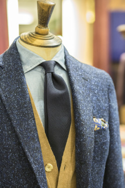 drakes-diary:  Drake’s Blue Donegal Jacket in Wool and Silk, Navy Small Weave Grenadine, Cleeve of London Chambray Shirt, Sleeveless Camel Hair Cardigan and Elephant Print Wool Silk Pocket Square. All available from No.3 Clifford Street or our Online